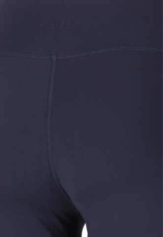 Athlecia Skinny Tights 'Blossom' in Blau