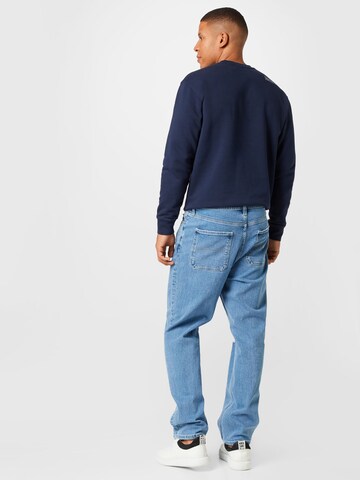 Tommy Jeans Szabványos Farmer 'Skater' - kék