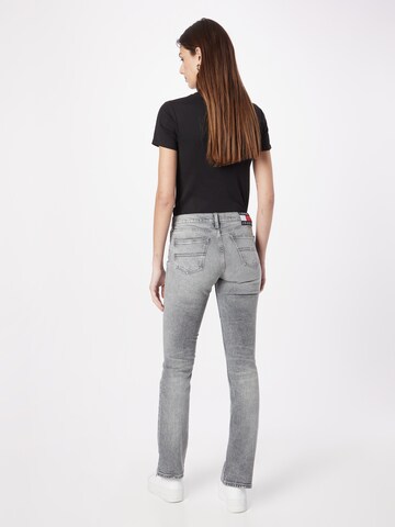 Tommy Jeans - Bootcut Calças de ganga 'MADDIE' em cinzento