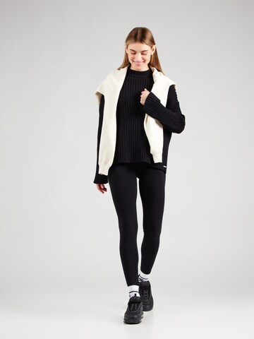 Pull-over de sport Aim'n en noir