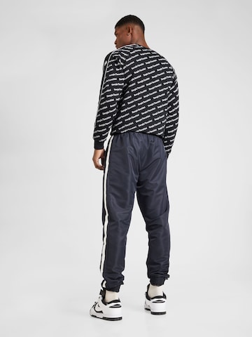 Sergio Tacchini Tapered Pants 'AGAVE' in Black