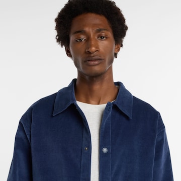 new balance Tussenjas in Blauw