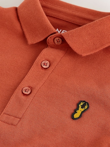 Tricou de la Next pe portocaliu