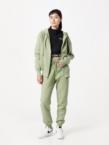 Nike Sportswear Zúžený strih Nohavice - Zelená