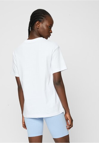 Mister Tee - Camiseta 'Utopia' en blanco