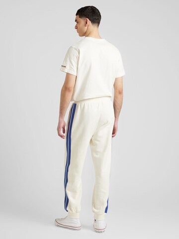 ELLESSE Tapered Pants 'Airla' in White