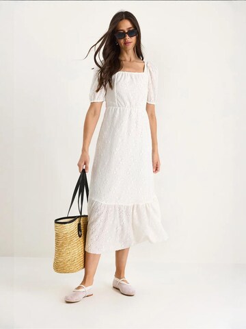 Abito di Bianco Lucci in bianco: frontale