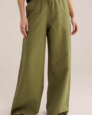 WE Fashion Широкий Штаны в Зеленый: спереди