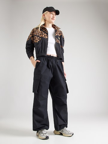 Reebok Tussenjas in Zwart