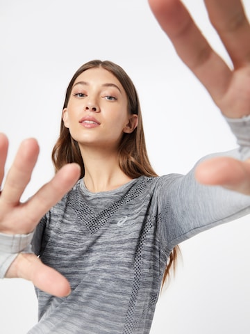 Maglia funzionale di ASICS in grigio