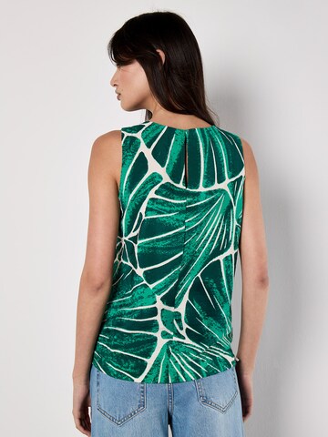 Haut Apricot en vert