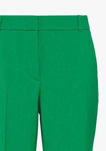 Tapered Pantaloni con piega frontale di COMMA in verde