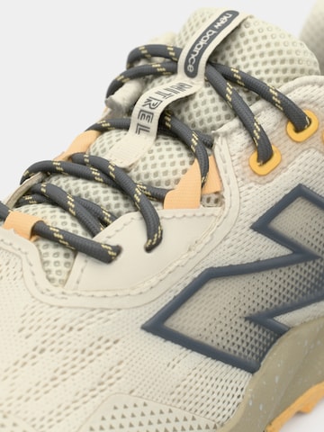 Chaussure de course 'Nitrel' new balance en beige