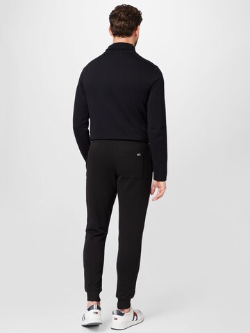 Tommy Jeans Tapered Hose in Schwarz