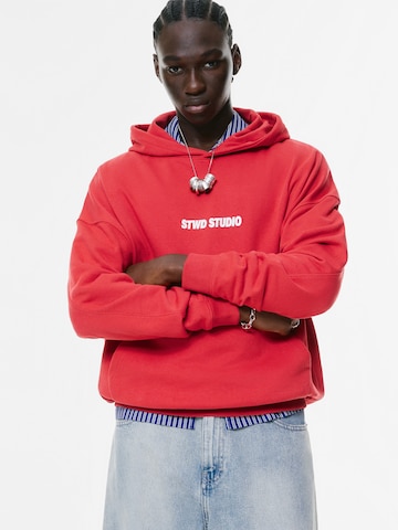 Sweat-shirt 'STWD STUDIO' Pull&Bear en rouge