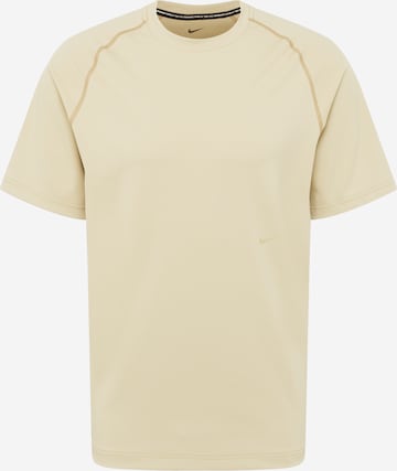 NIKE Performance shirt in Beige: front