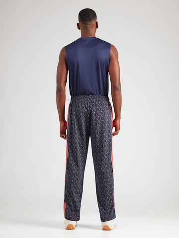 PUMA Loosefit Παντελόνι φόρμας 'Road To Unity' σε μπλε