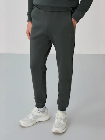 Tommy Life Joggingpak in Groen