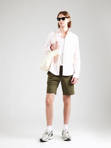 TOMMY HILFIGER Slimfit Chino kalhoty 'BROOKLYN 1985' – zelená