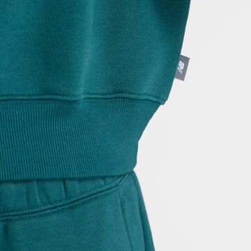 new balance Sweatshirt 'Trackside Fleece Crew' in Groen