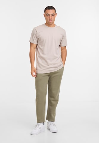Effilé Pantalon 'Essential' Urban Classics en vert