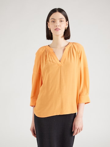 COMMA Blus i orange: framsida