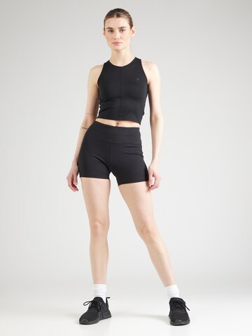 Skinny Pantaloni sportivi di Champion Authentic Athletic Apparel in nero