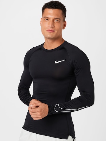 NIKE Regular Fit Funktionsskjorte i sort: forside