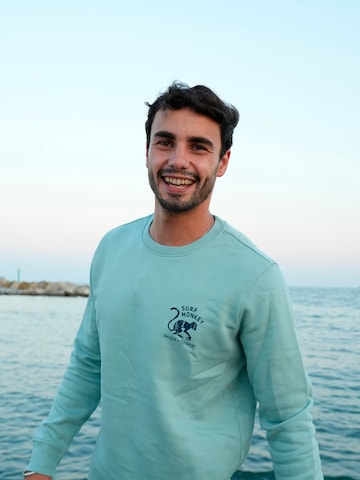 Surf Monkey Sweatshirt 'Rette das Ozean' in Blau