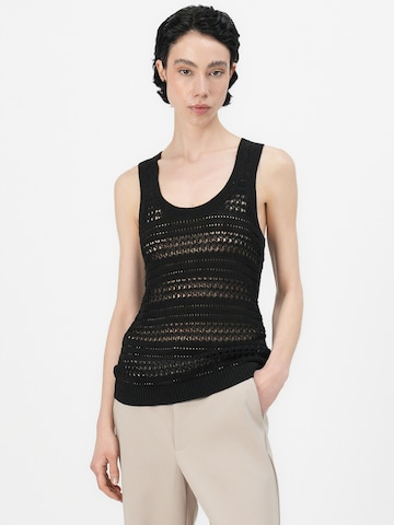 TOMMY HILFIGER - Top de punto en negro