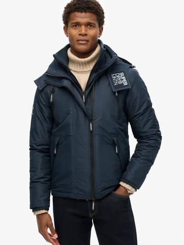 Veste mi-saison Superdry en bleu : devant