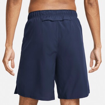 NIKE Regular Workout Pants in Blue