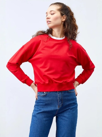 Sweat-shirt Tommy Life en rouge