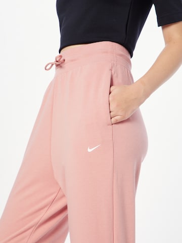 NIKE Tapered Workout Pants in Red