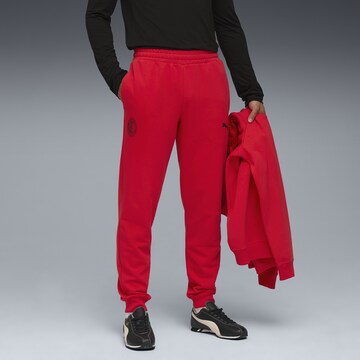PUMA Tapered Sportbroek 'AC Milan FtblEssentials' in Rood: voorkant