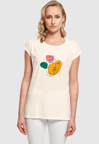 Merchcode T-Shirt 'Woman And Flower' in Beige: Vorderseite