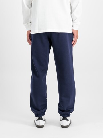 ALPHA INDUSTRIES Tapered Pants in Blue