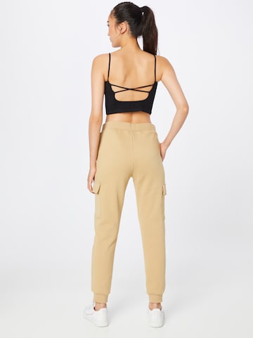 Effilé Pantalon cargo Urban Classics en beige