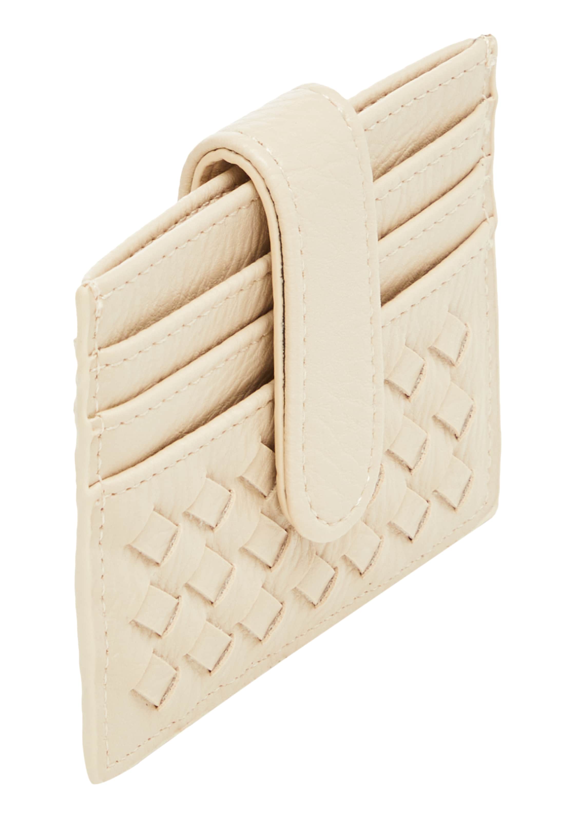 Etui de la Usha pe alb