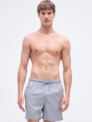 Calvin Klein Swimwear Hlače za k noši | siva barva: sprednja stran