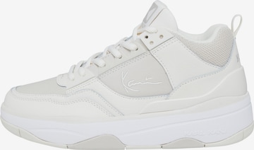 Baskets basses Karl Kani en beige : devant