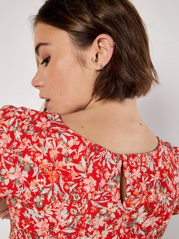 Chemisier Apricot en rouge