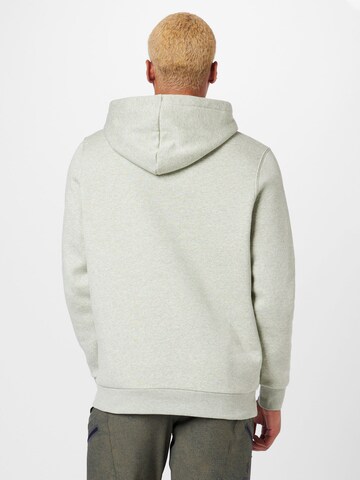 UNDER ARMOUR - Sweatshirt de desporto 'Essential' em verde