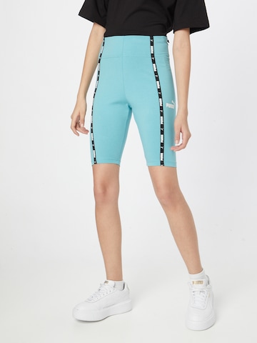 PUMA Skinny Sportsbukse 'Power 9' i blå: forside