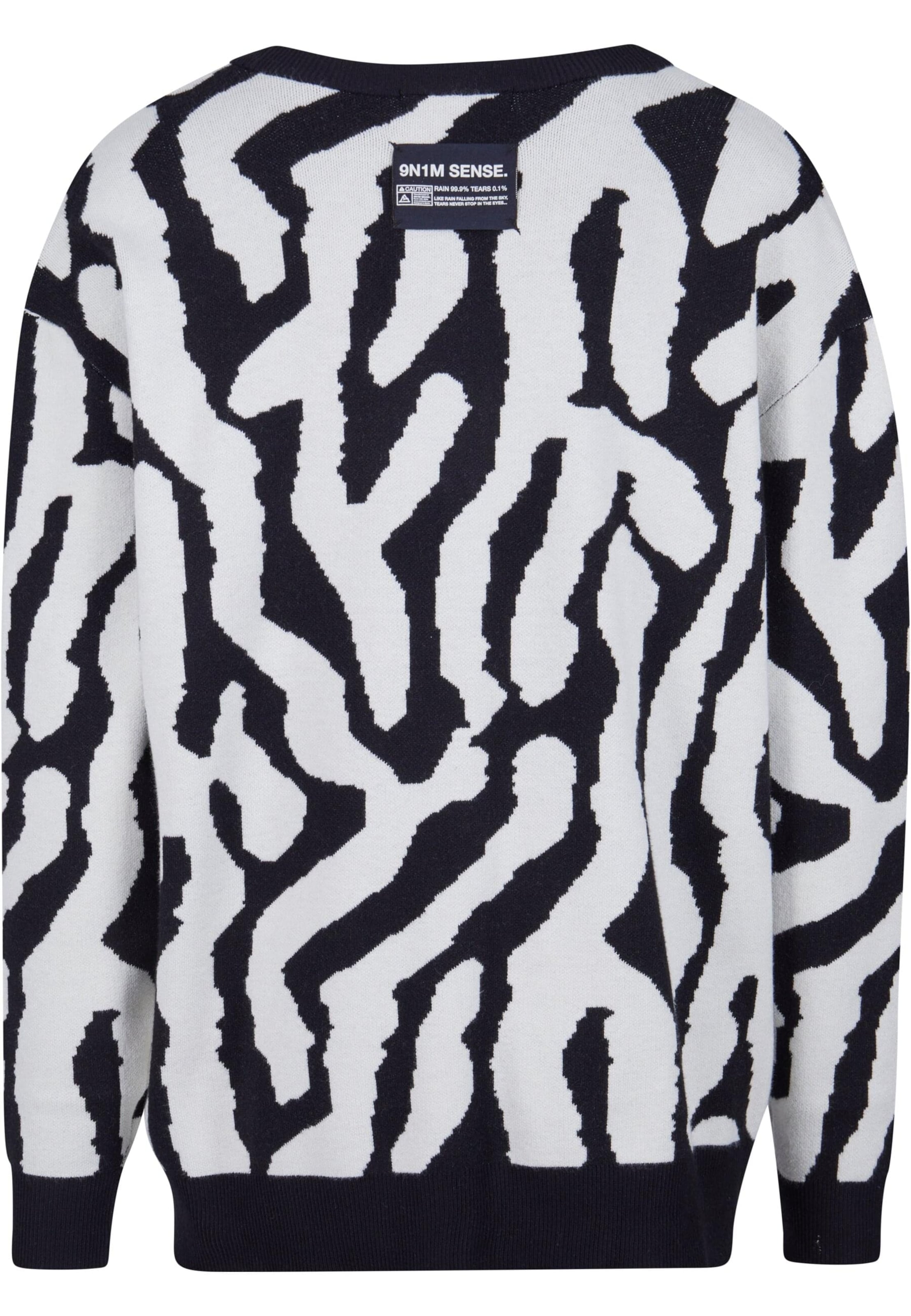 Geacă tricotată de la 9N1M SENSE pe alb