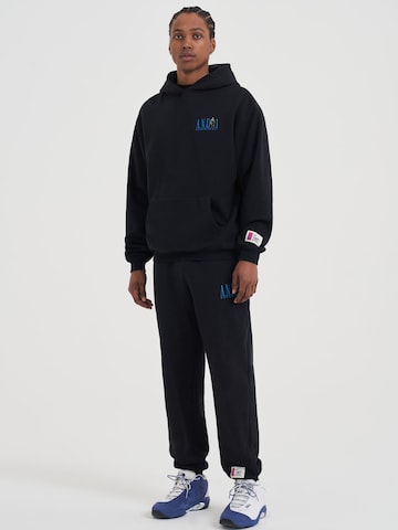 Effilé Pantalon AND1 en noir