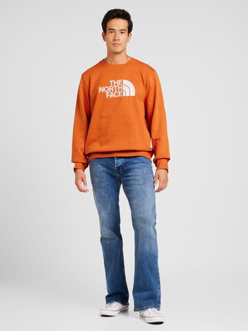 Felpa 'DREW PEAK' di THE NORTH FACE in arancione