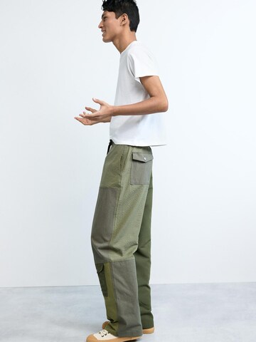 Desigual Zvonové kalhoty Kapsáče – zelená