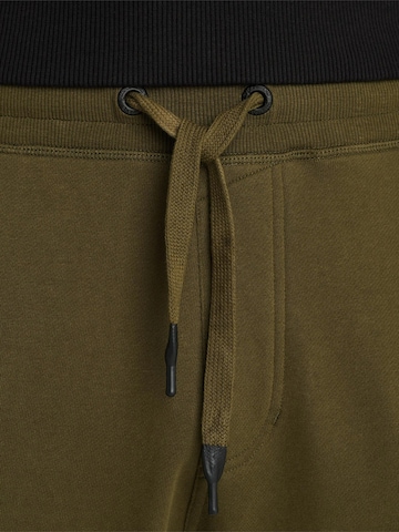 PME Legend Loosefit Urheiluhousut 'Skyglizer sweatpants' värissä vihreä