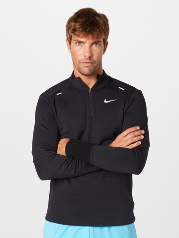 NIKE - Camisa funcionais em preto: frente